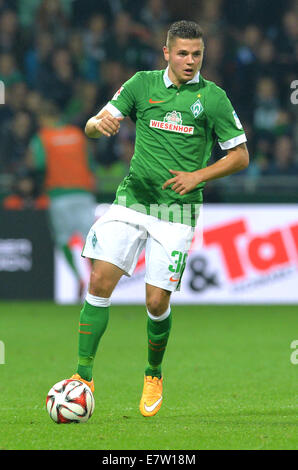 Bremen, Germania. 23 Sett 2014. Brema Marnon Busch in azione la Bundesliga soccer match tra Werder Brema e FC Schalke 04 a Weserstadium di Brema, Germania, 23 settembre 2014. Credito: dpa picture alliance/Alamy Live News Foto Stock