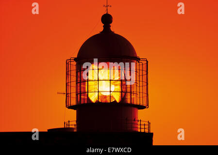 Il Portogallo, Algarve: Tramonto presso il faro di Capo San Vincenzo Foto Stock