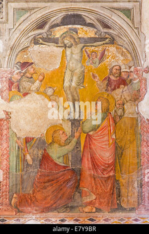 Padova, Italia - 9 Settembre 2014: l'affresco della Crocifissione o Calvario nella chiesa di San Nicolò (San Nicola) dal pittore sconosciuto Foto Stock