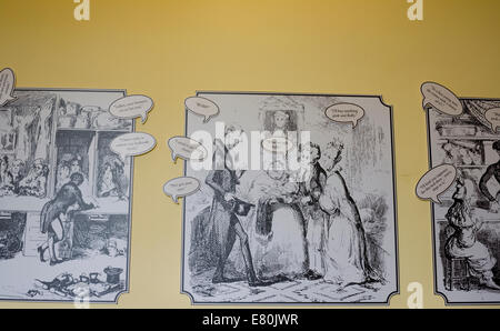 Schizzi di personaggi e di parlato di bolla sulla parete in Charles Dickens Birthplace Museum Foto Stock