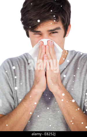 Immagine composita del ritratto di uomo soffia il naso Foto Stock