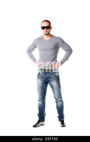 Amichevole Casual Uomo in jeans e pullover - isolato su uno sfondo bianco Foto Stock