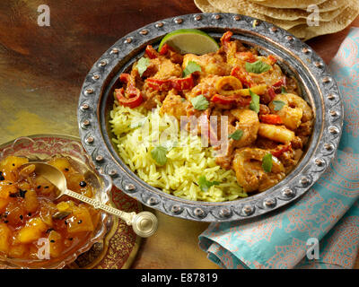 Il curry di gamberi con chutney di mango Foto Stock