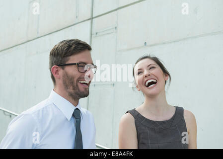 Due partner commerciali di ridere Foto Stock