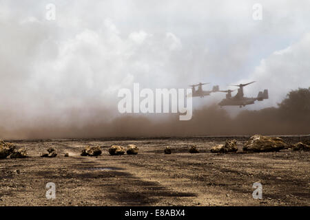Due Stati Uniti Marine Corps MV-22B Osprey tiltrotor aeromobili partecipano Valiant scudo 2014 di Tinian, Isole Marianne Settentrionali, Sett. 21, 2014. Valiant Shield è una biennale U.S. Air Force, Navy e Marine Corps esercizio tenutasi a Guam, concentrandosi su real-world Foto Stock