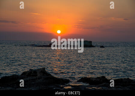 Tramonto a milos in Grecia Foto Stock