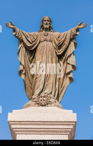 Outdoor statua di Gesù con le braccia aperte Foto Stock