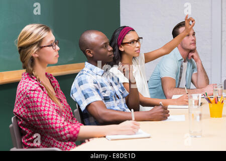 Attento ai colleghi creativi in riunione Foto Stock