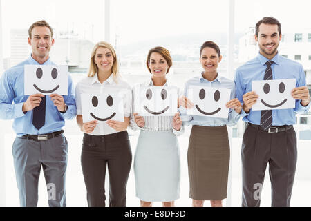 La gente di affari azienda felice smiley in office Foto Stock