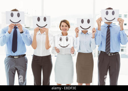 La gente di affari azienda felice smiley Foto Stock