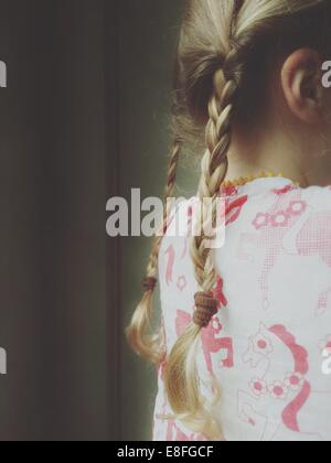 Close-up di una ragazza in trecce Foto Stock