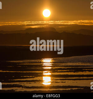 Paesaggio con sole riflessa nelle pozze Foto Stock