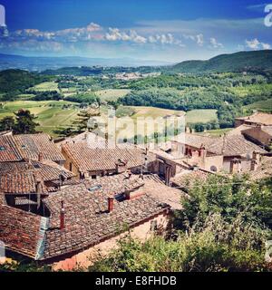 Tetti e campagna rurale, Toscana, Italia Foto Stock