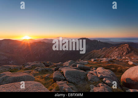 Il tramonto di capra è sceso, Isle of Arran, Scozia Foto Stock