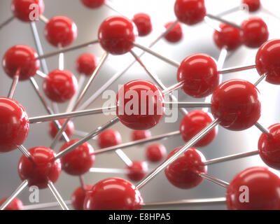 Struttura molecolare con sfere rosse interconnessa con la profondità di campo. Foto Stock