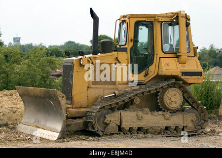 Vecchie e arrugginite Bulldozer giallo. Foto Stock