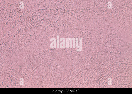 Primo piano di un dipinto di parete rosa Foto Stock