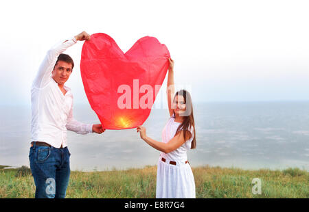 Giovane Donna Con Una Lanterna Cinese Del Cielo Fotografia Stock - Immagine  di amore, giovane: 40999064