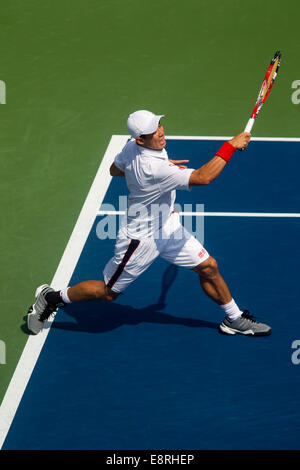 Kei Nishikori (JPN) sconfisse top-seme e mondo No. 1 Novak Djokovic (SRB) negli uomini Semi-Final per raggiungere la sua prima carriera Gra Foto Stock