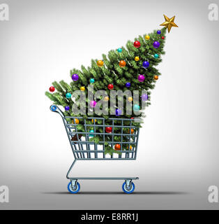 Shopping di Natale nozione come un negozio shop carrello trasporta un gusto natalizio pino come un simbolo per il venerdì nero vendita Foto Stock