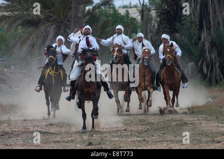 Giochi equestri, Fantasia, Midoun Djerba, Tunisia Foto Stock