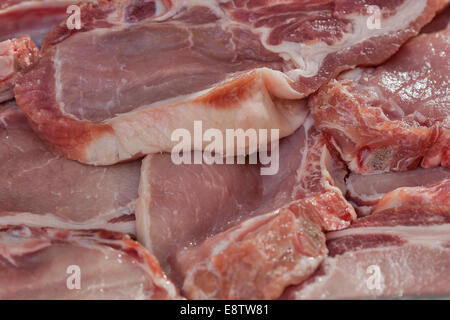 Materie tagliati a fettine di carne di maiale background closeup Foto Stock