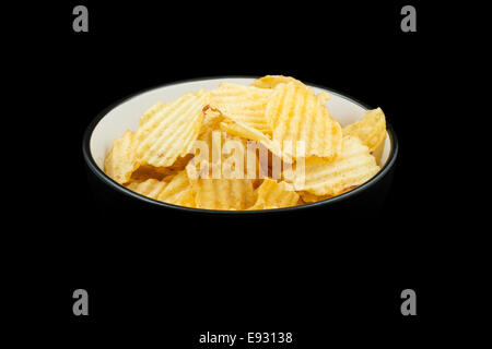 Ribbed patatine fritte in un recipiente Foto Stock