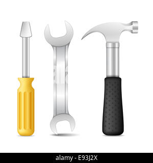Cacciavite, chiave e un martello su sfondo bianco Foto Stock