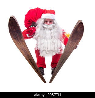 Santa Claus salti sugli sci Foto Stock