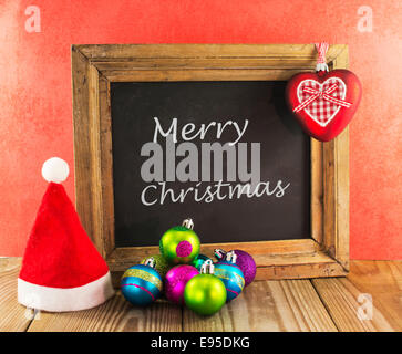 Buon natale con blackboard e rosso Foto Stock