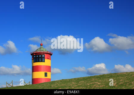 Faro Pilsum, Mare del Nord, Germania Foto Stock