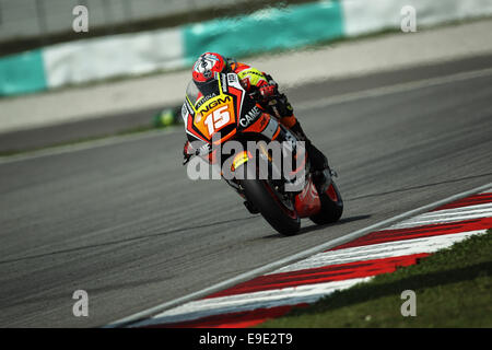 Sepang, Malesia. 25 ott 2014. Cal Crutchlow del Team Ducati in azione durante il sabato le sessione di prove libere del Malaysian Motorcycle Grand Prix tenutosi al Sepang International Circuit di Sepang, in Malesia. Credito: Azione Sport Plus/Alamy Live News Foto Stock