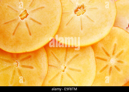 Persimmon fette di frutta Foto Stock