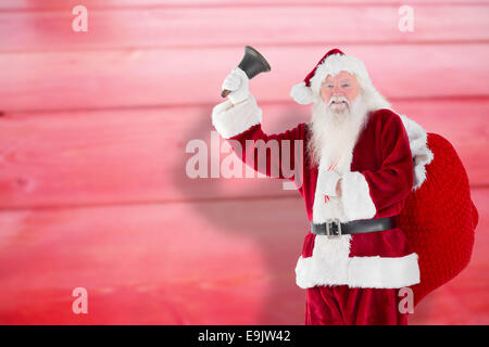 Immagine composita di santa claus campana che squilla Foto Stock