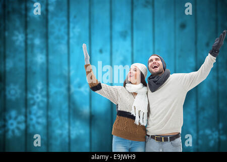 Immagine composita della giovane coppia di inverno Foto Stock