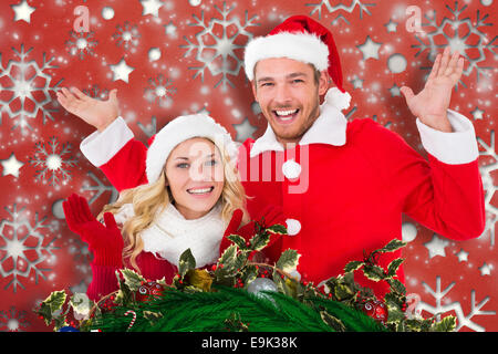 Immagine composita della giovane coppia di festa Foto Stock