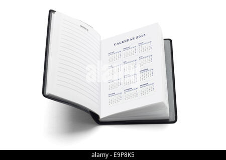 Agenda tascabile con 2015 Calendario su sfondo bianco Foto Stock