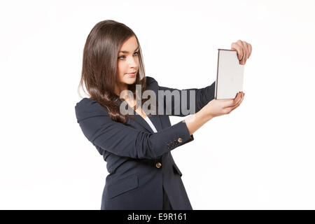 Giovane donna di affari di lavoro incentrato sui tablet Foto Stock