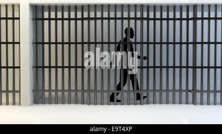 Persona in carcere dietro le sbarre Foto Stock