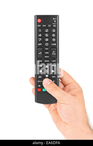 TV con telecomando in mano Foto Stock