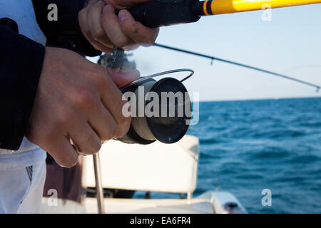 L'Italia, Puglia, TA, Ginosa, Marina di Ginosa, Close-up di canna da pesca Foto Stock