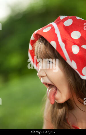 Ragazza in un Red Hat Foto Stock