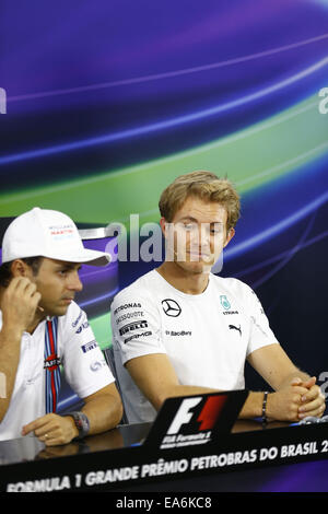 Motorsports: FIA Formula One World Championship 2014, il Gran Premio del Brasile, #19 Felipe Massa (BRA, Williams Martini Racing), #6 Nico Rosberg (GER, Mercedes AMG Petronas Team di F1), Foto Stock