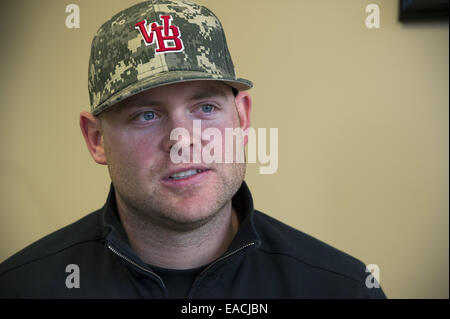 Alpharetta, GA, Stati Uniti d'America. 5 febbraio, 2014. Brian McCann, ex Atlanta Braves catcher firmato con New York Yankees. Foto della sua famiglia Baseball sopravento Academy di Alpharetta GA © Robin Rayne Nelson/ZUMA filo/Alamy Live News Foto Stock