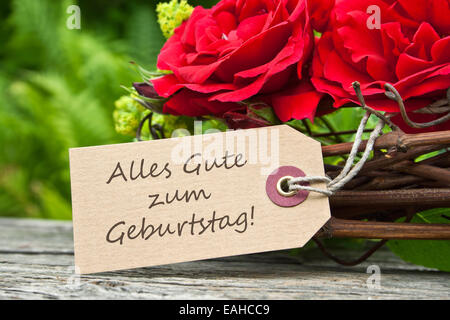 Biglietto di auguri di compleanno con rose rosse Foto Stock