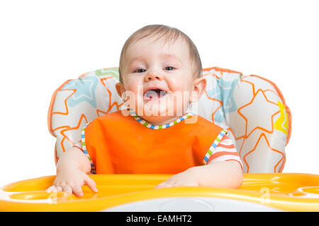 Happy baby bambino in attesa di cibo Foto Stock