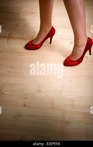 Woman in Red shoes Foto Stock