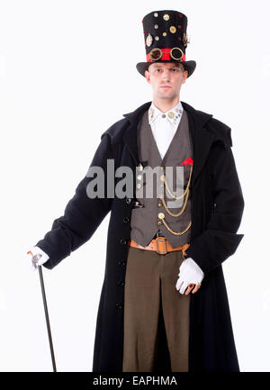 Ritratto di un mago con alto cappello, lungo cappotto e orologio i dettagli delle parti Foto Stock