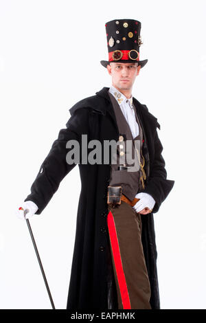 Ritratto di un mago con alto cappello, lungo cappotto e orologio i dettagli delle parti Foto Stock