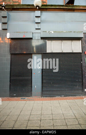 Donegall Place, Belfast,UK 19 Novembre 2014. Una elevata percentuale di vuoti nei locali di vendita al dettaglio su uno di Belfast 's strada principale dello shopping di credito: Bonzo Alamy/Live News Foto Stock